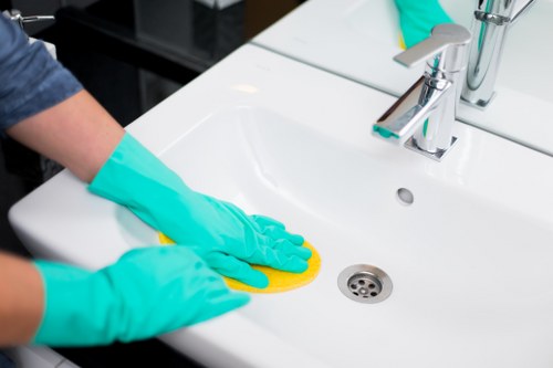 Builders cleaning in Kingston upon Thames for a modern property interior